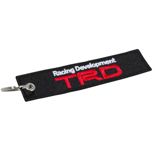 Брелок автомобильный TRD Racing Development вышитый полоса ( лента ) 13х3 черный (4402411) - HAKKI