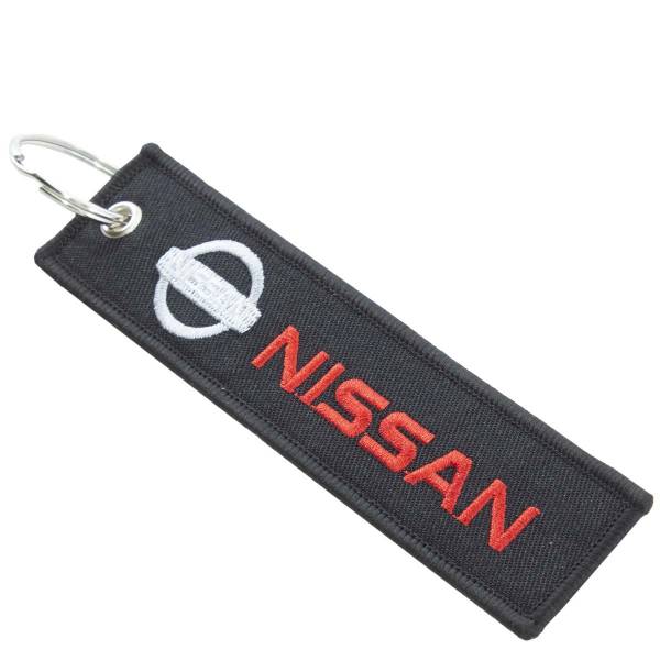 Брелок автомобильный марка NISSAN ( НИССАН ) вышитый полоса ( лента ) 13х3 черный (4402244) - HAKKI