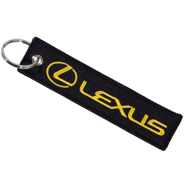Брелок автомобильный марка LEXUS ( ЛЕКСУС ) вышитый полоса ( лента ) 13х3 черный (4402973) - HAKKI
