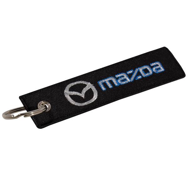 Брелок автомобильный марка MAZDA ( МАЗДА )  вышитый полоса ( лента ) 13х3 черный (4402421) - HAKKI