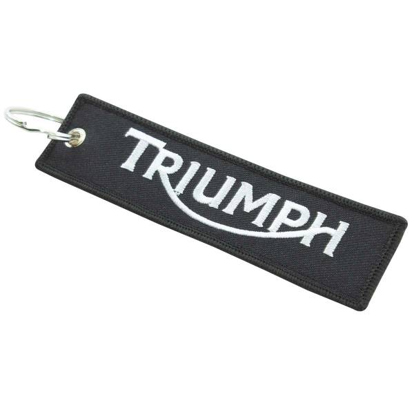 Брелок с символикой TRIUMPH ( ТРИУМФ ) вышитый полоса ( лента ) 13х3 черный (4402327) - HAKKI