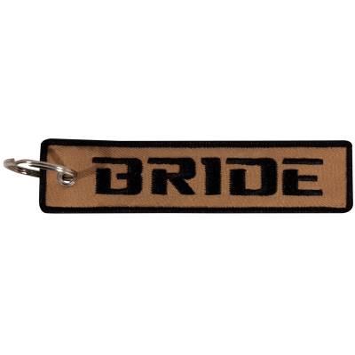 Брелок BRIDE вышитый полоса ( лента ) 13х3 бежевый (4402439) - HAKKI.RU